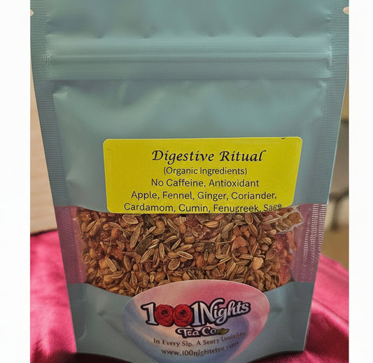 Tea package labeled 'Digestive Ritual' from 100 Nights Tea Co on a pink surface.